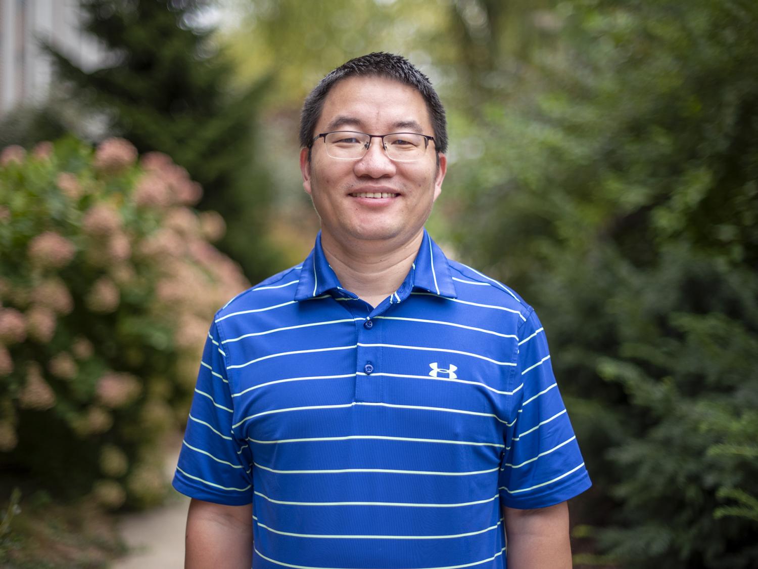 Shimin Liu outside smiling