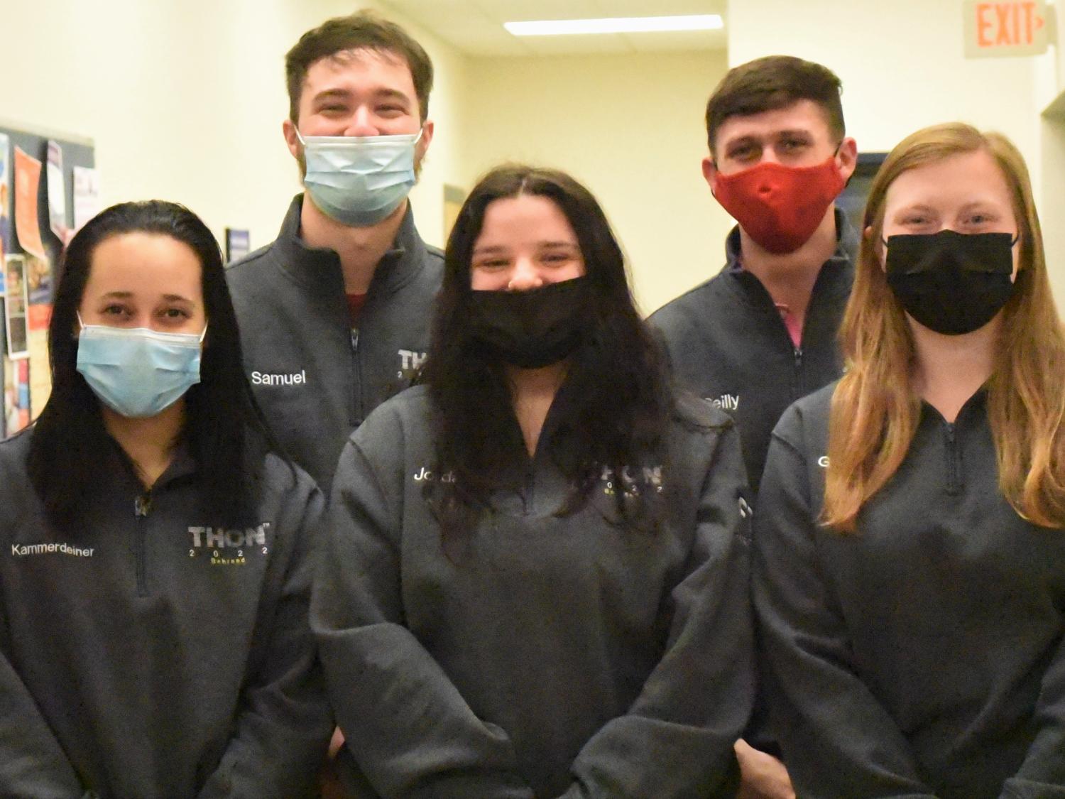 Five Penn State Behrend students pose in their THON sweaters.