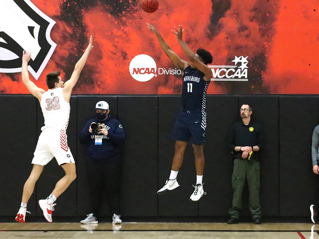 Men playing basketball