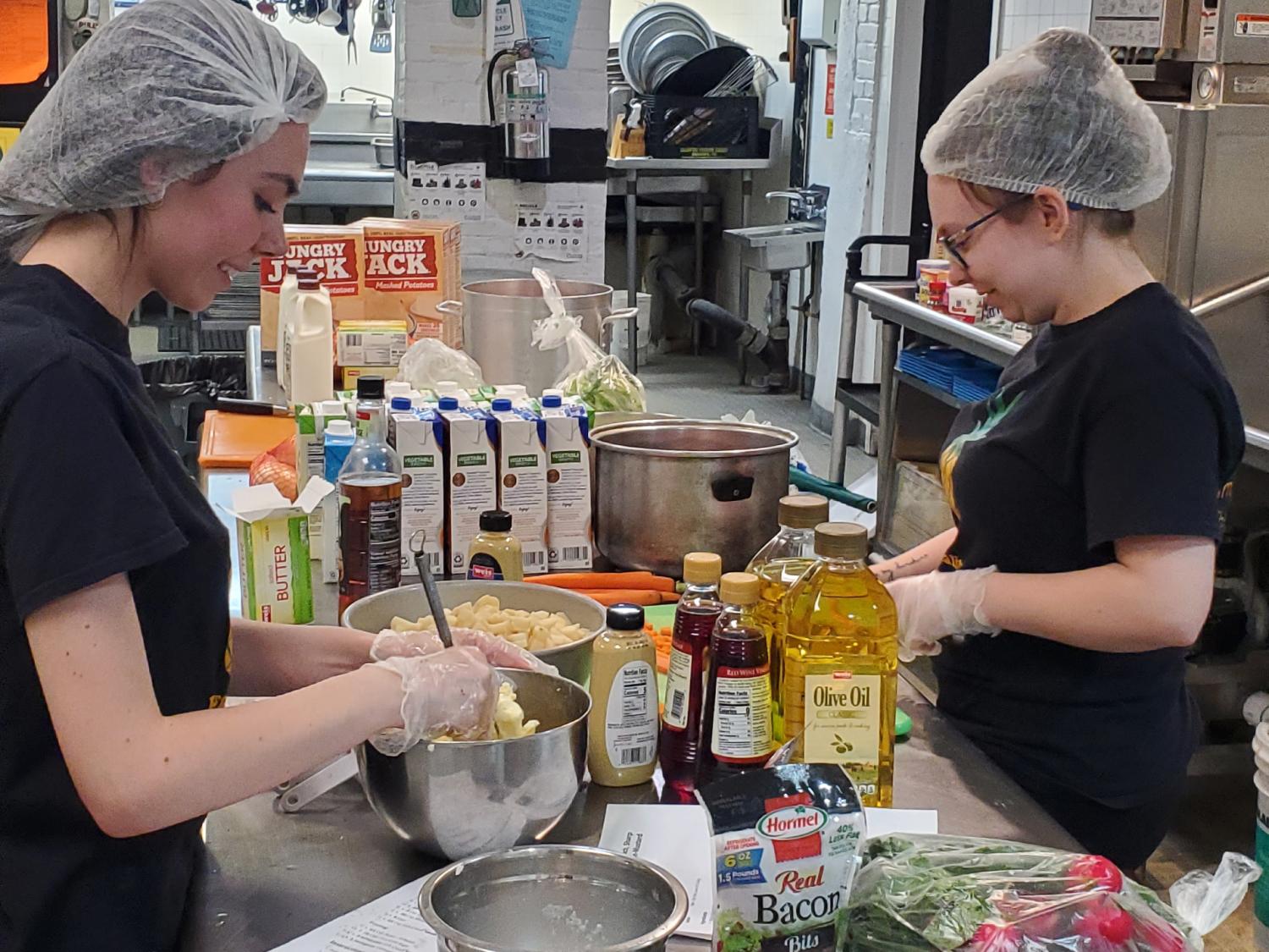 students prepare a five-star meal at Opportunity House
