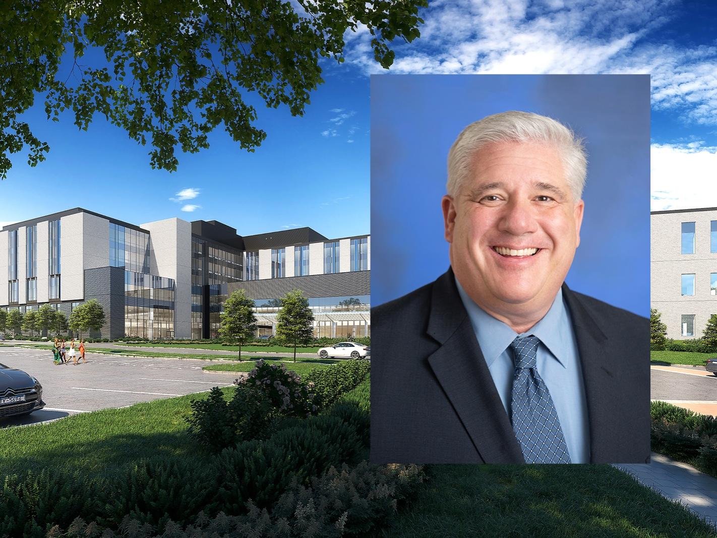 A headshot of Dr. Michael Reihart wearing a suit is placed over a rendering of the future Penn State Health Lancaster Medical Center.