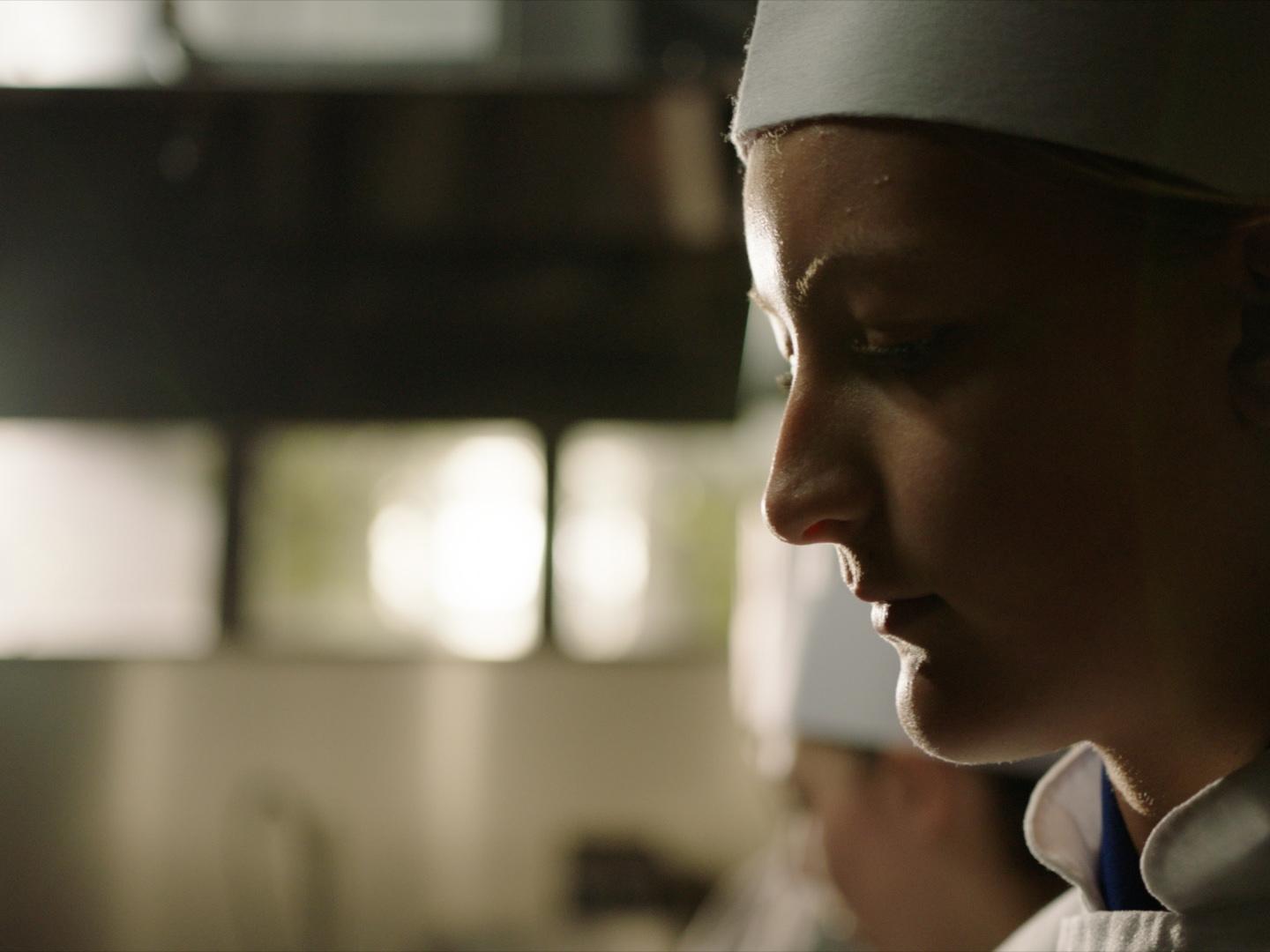 An image of a person looking thoughtful