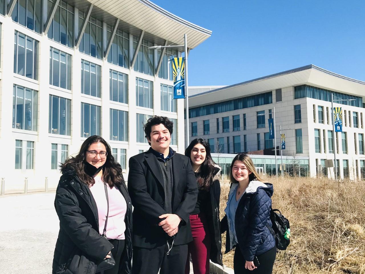 Students pose for picture at conference 