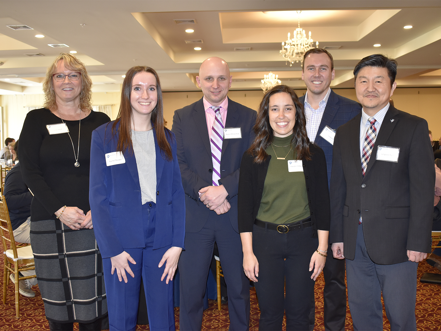 Students pose with donors at the 2022 scholarship lunch