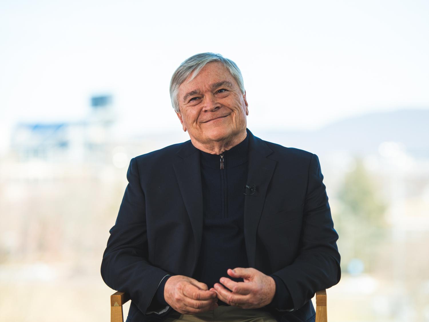 Barron sitting in chair looking at camera