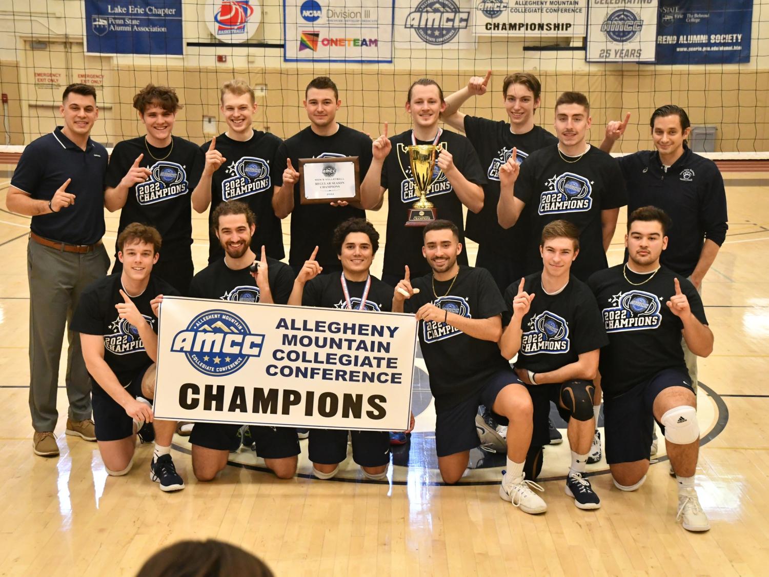The Penn State Behrend men's volleyball team celebrates after winning the AMCC championship.