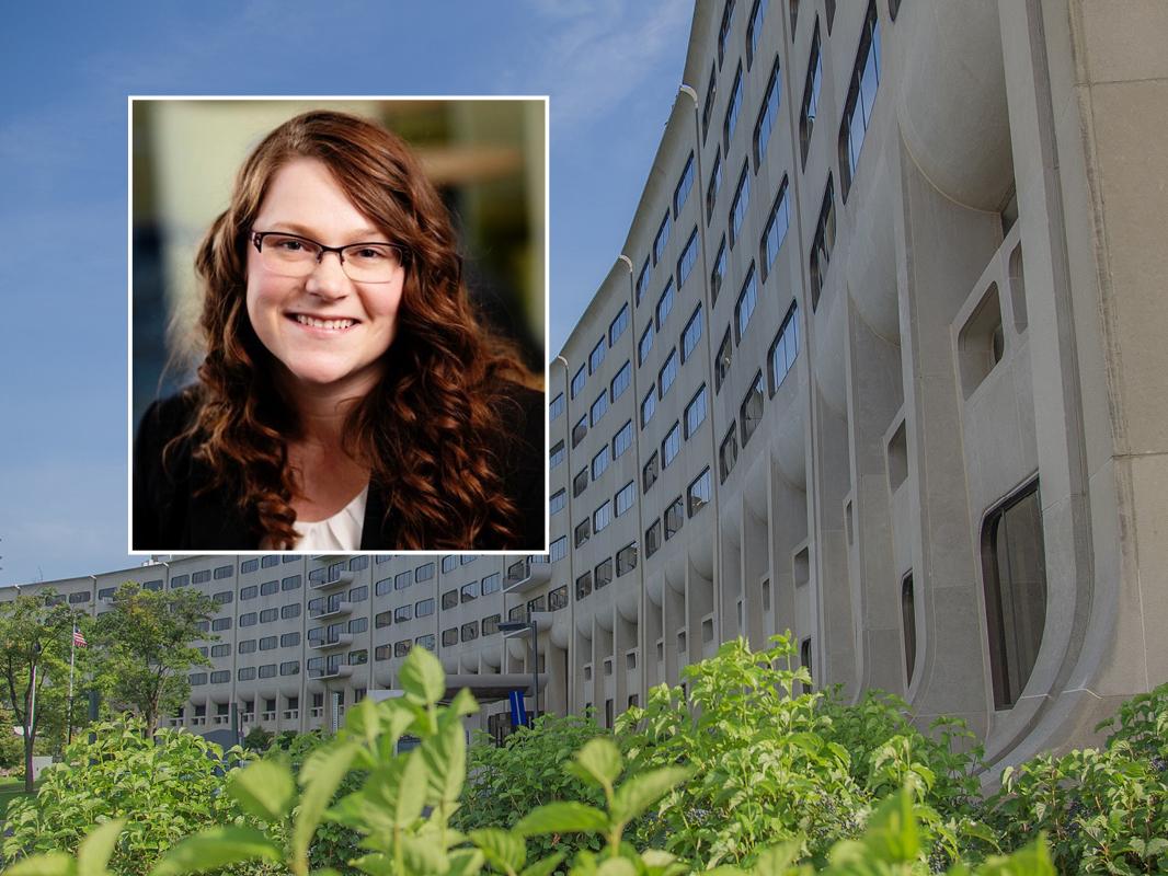 A headshot image of Larissa Whitney is superimposed on a photo of the Penn State College of Medicine "crescent."
