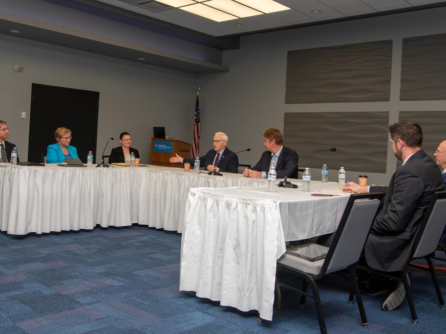 A group of people sitting at a table