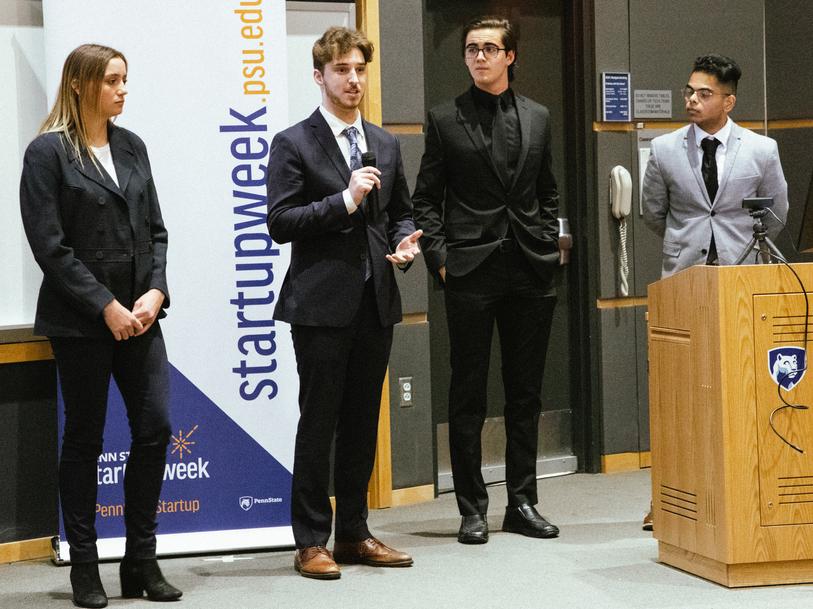 A group of four students pitch their IdeaMakers Challenge idea during Penn State Startup Week.