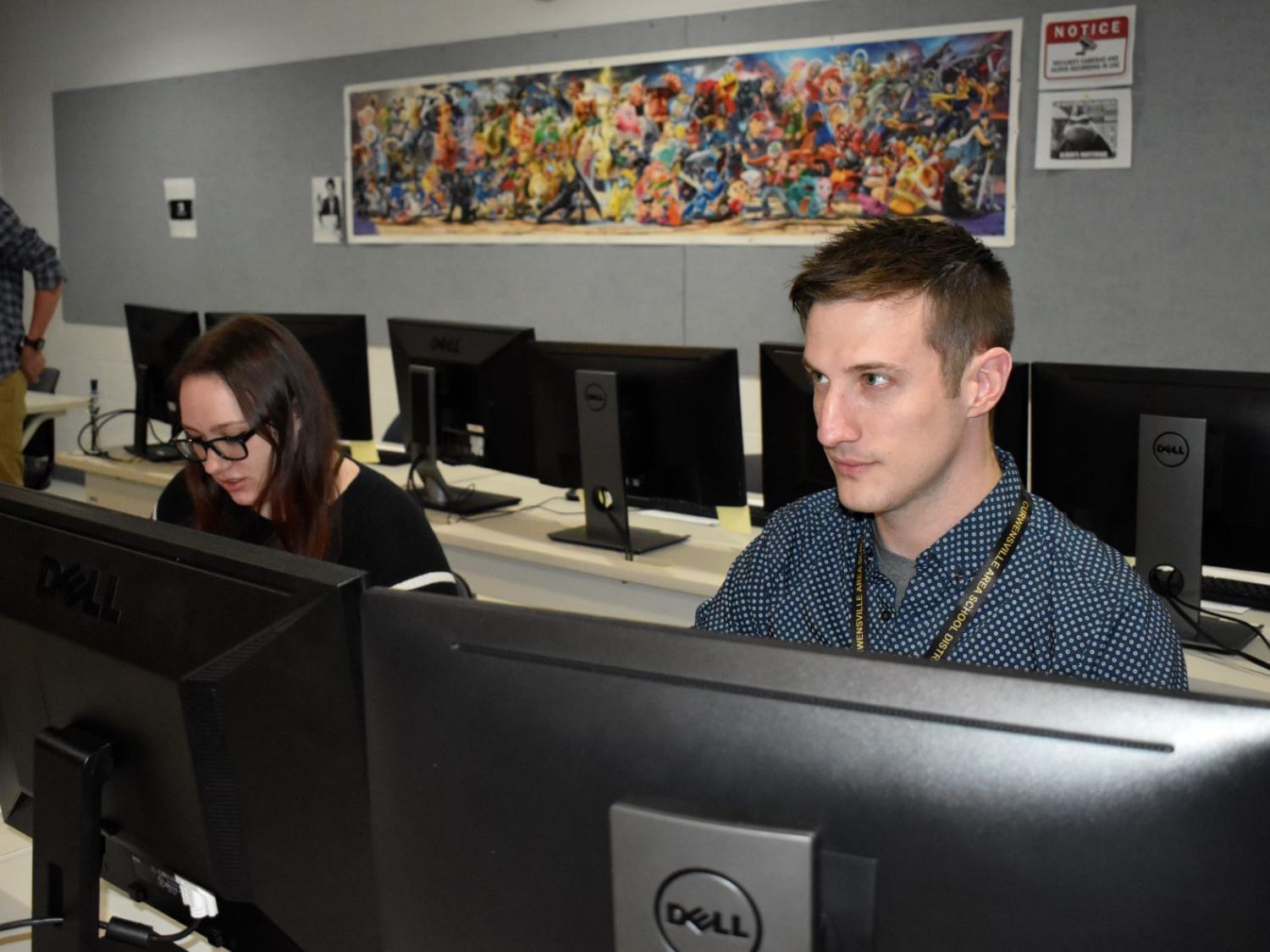 IT alumni reviewing student projects