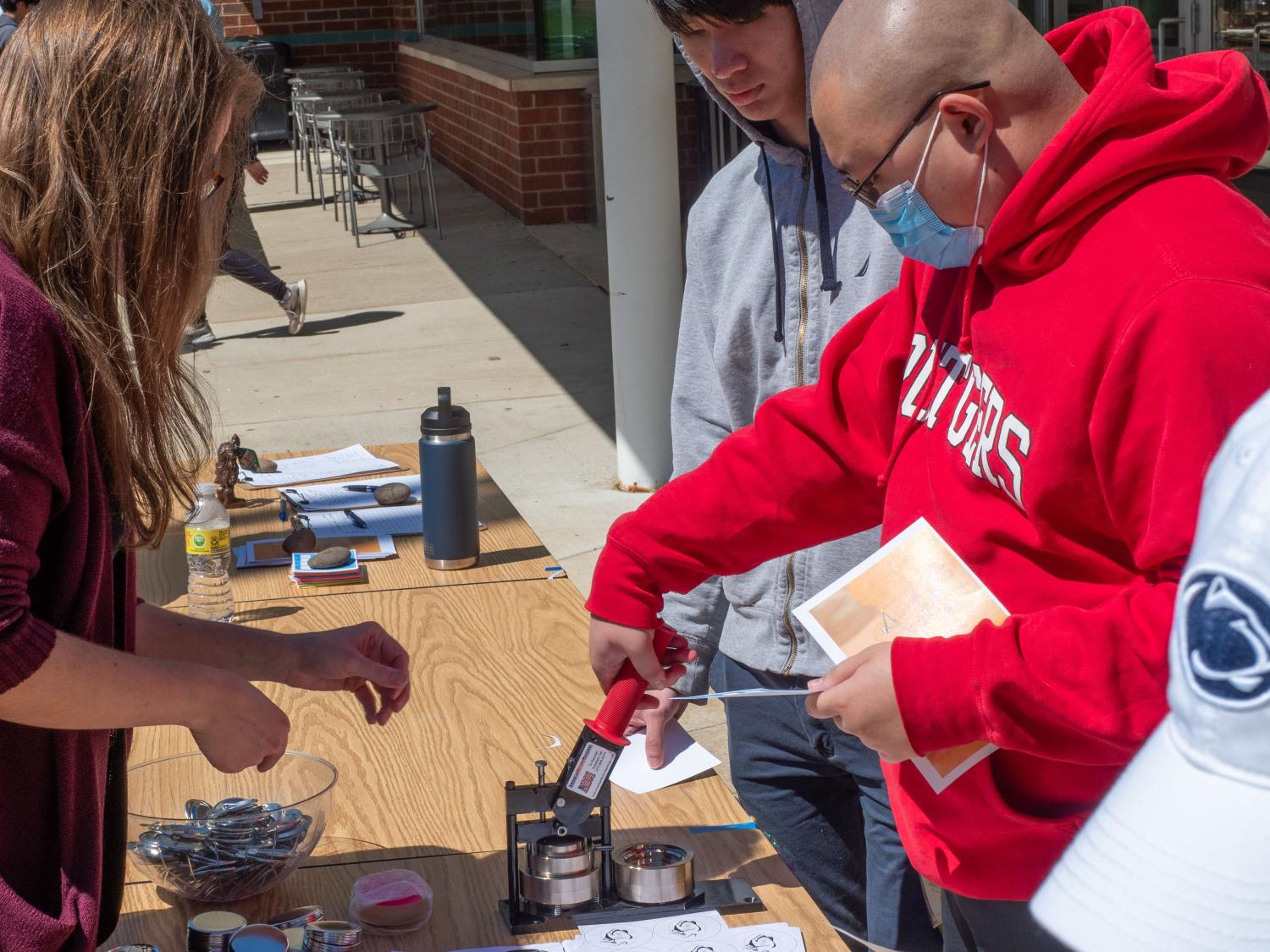 Students make buttons at Arts Fest 