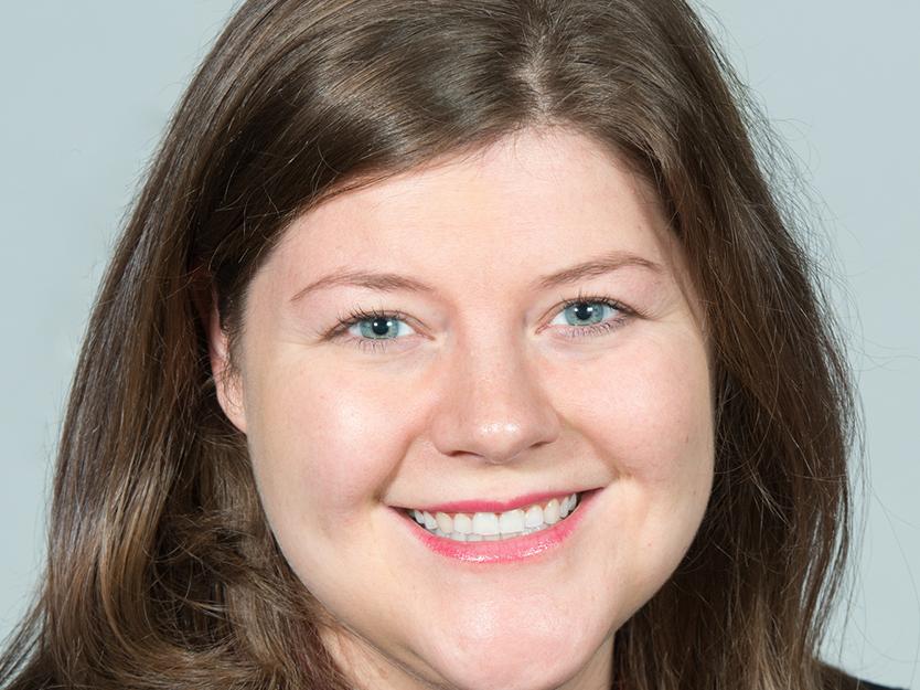 Headshot photo of a smiling Heather Robbins