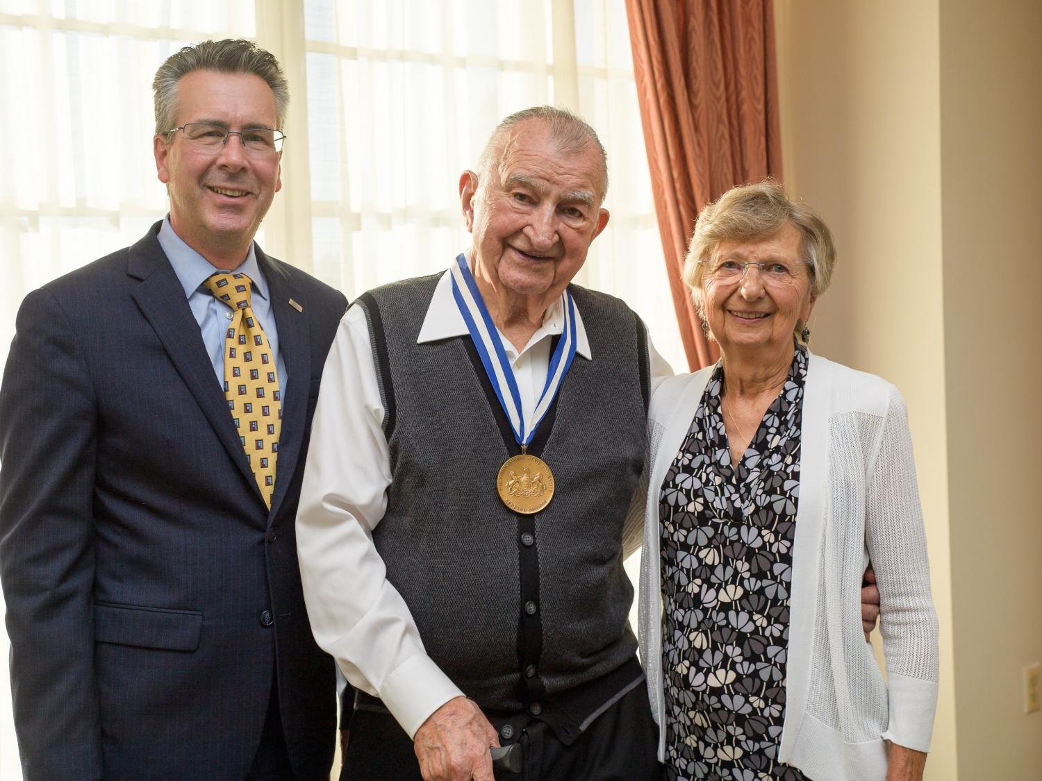 Penn State Behrend Chancellor Ralph Ford poses with Joe and Isabel Prischak.
