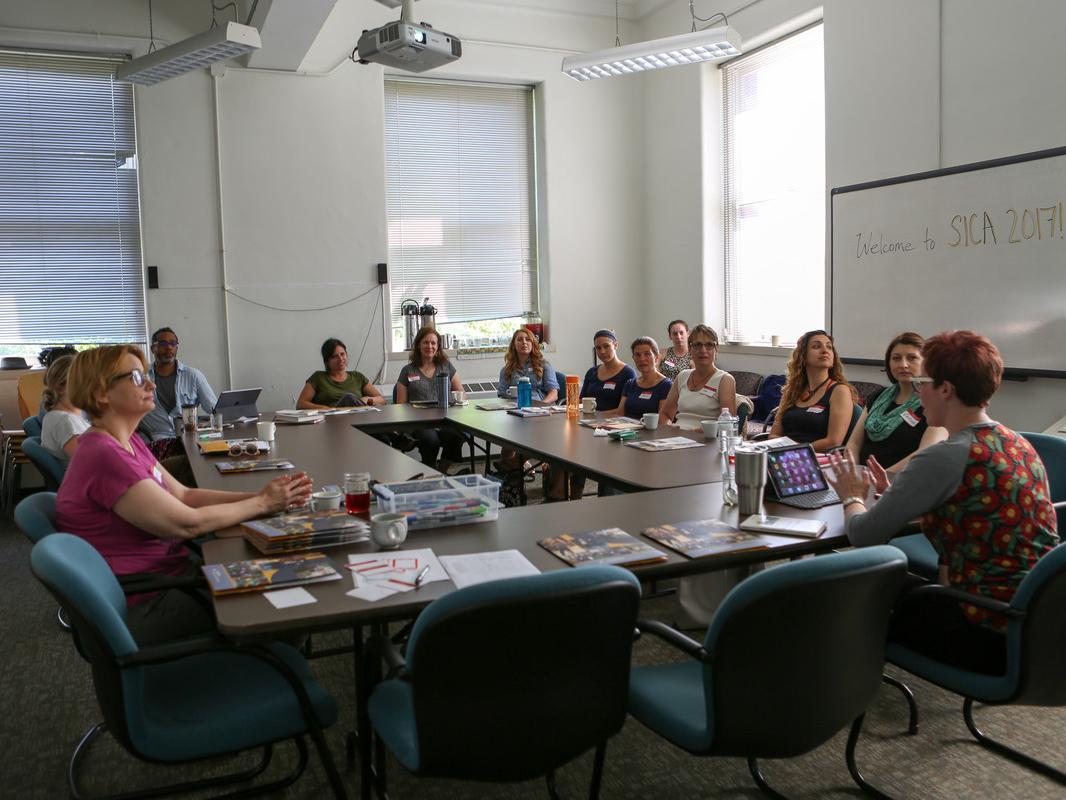 Teachers sitting around a table