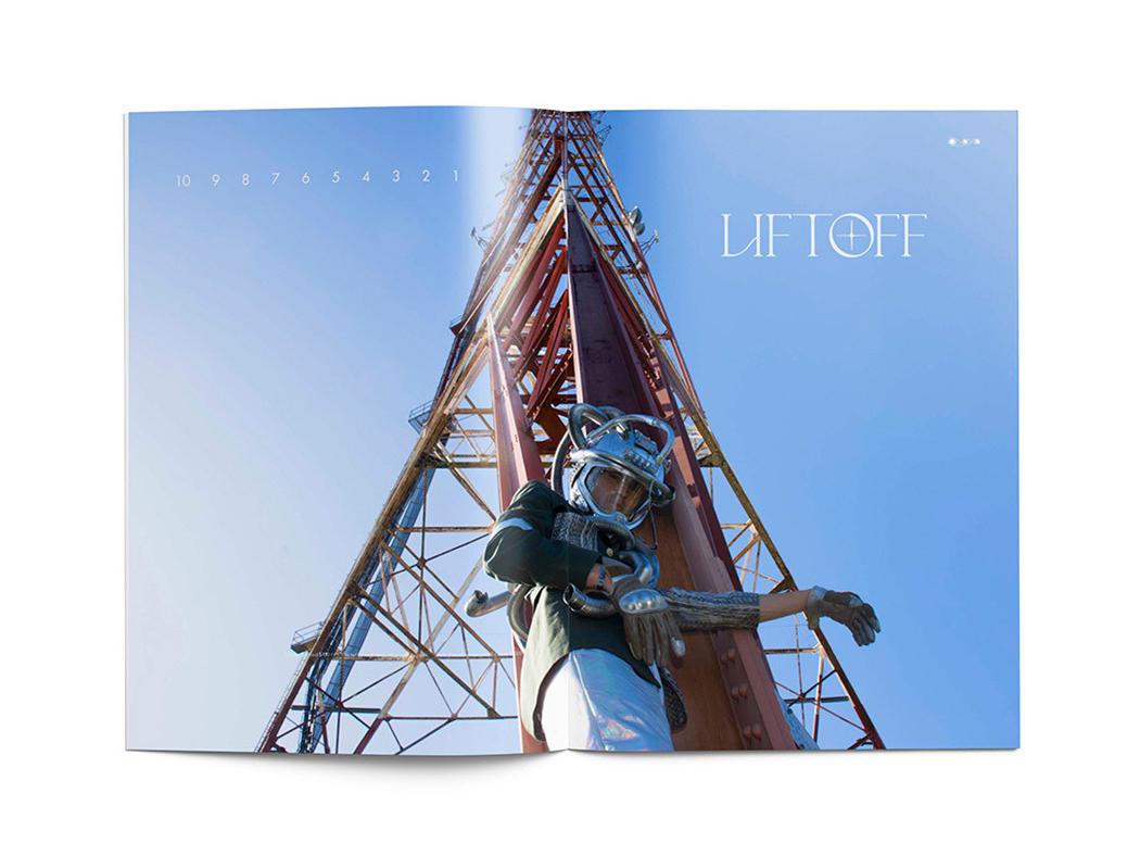 A magazine spread of a man in space suit on a launch pad with the word liftoff in white.