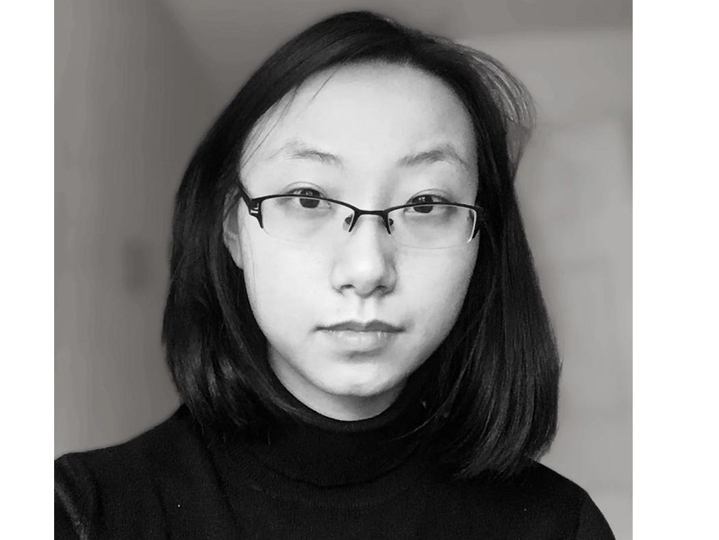 Black and white headshot of Xi Jin