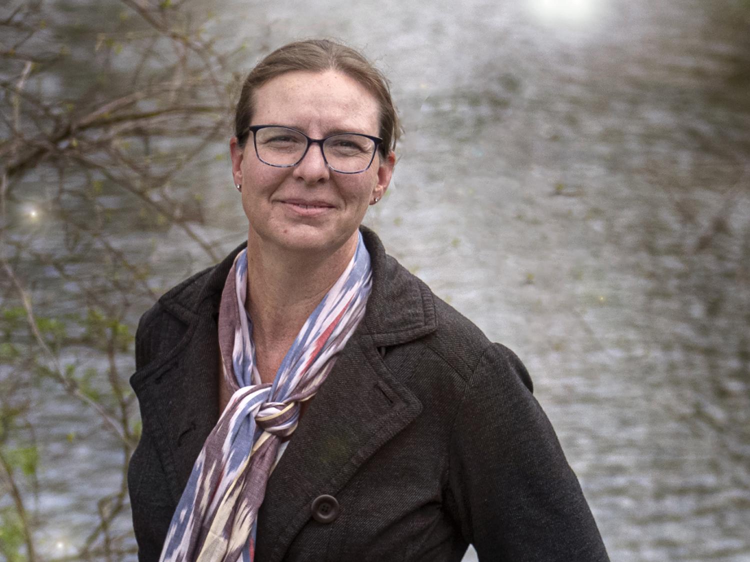 Lara Fowler in front of water