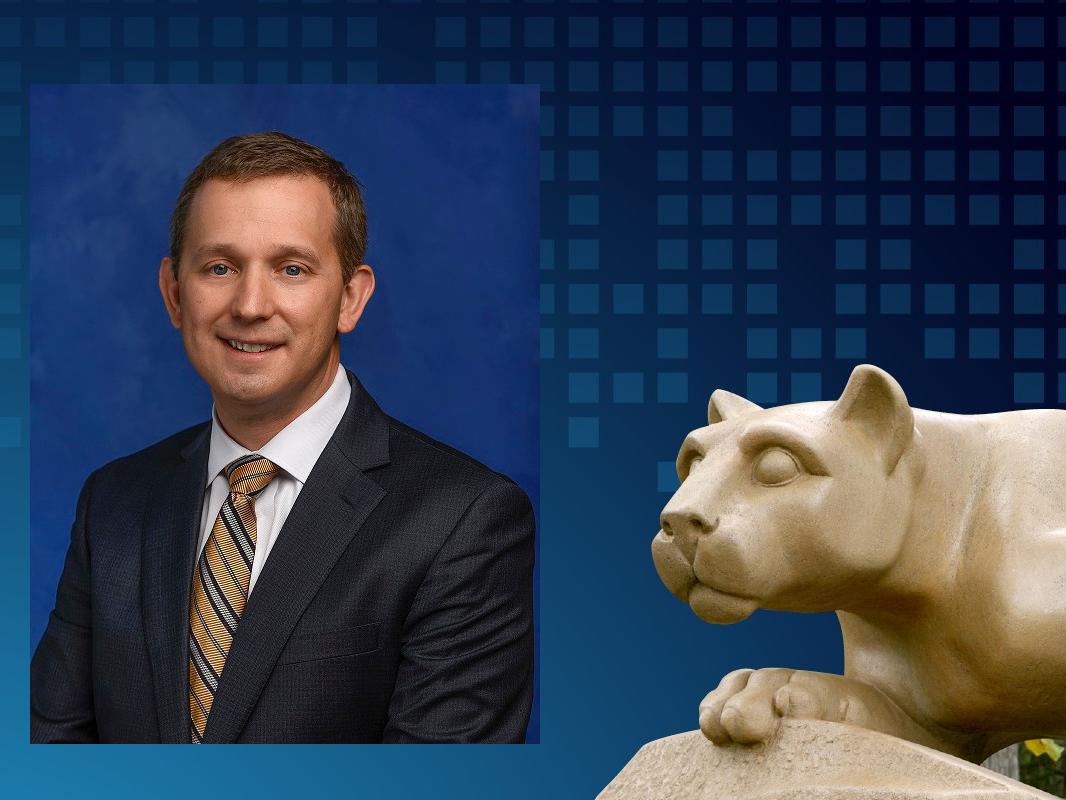 A headshot of a man smiling overlaid on a graphic with a statue of a lion 