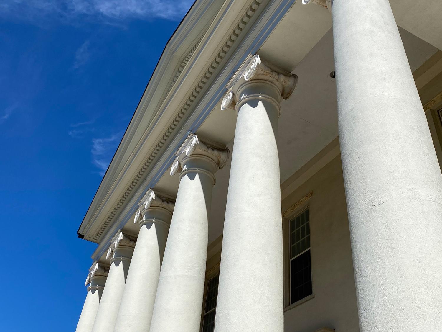 A closeup of columns outside a courthouse.