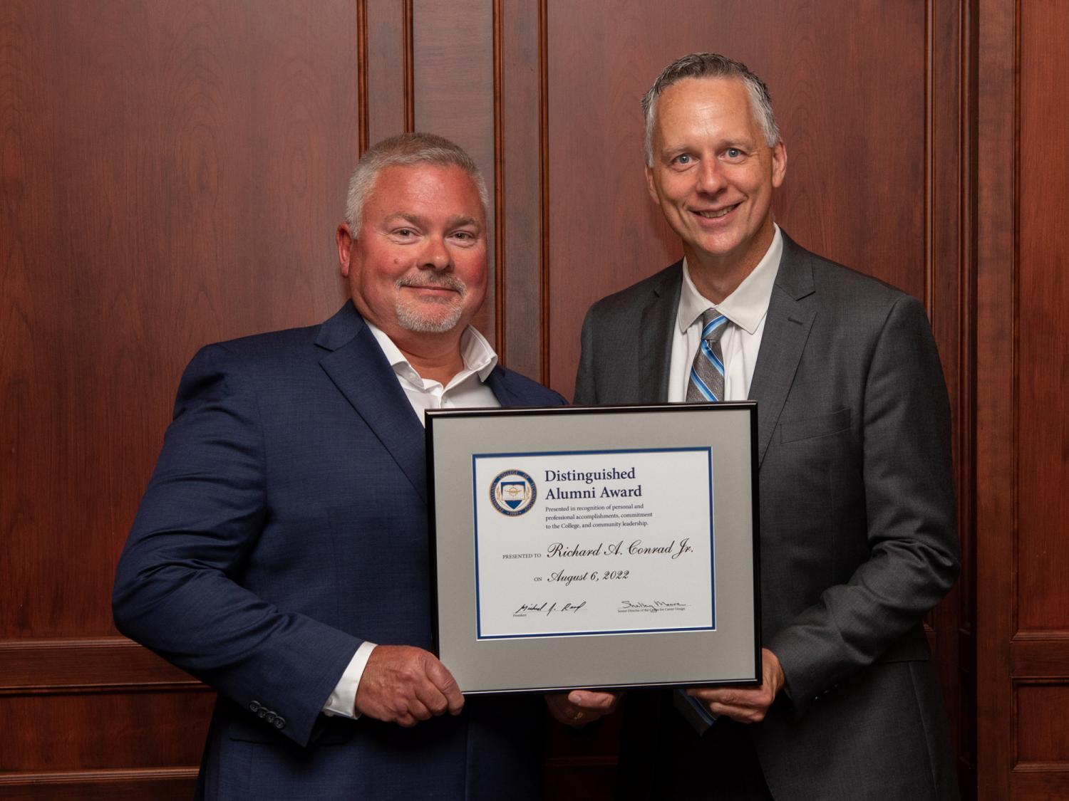 Award recipient with Penn College president 