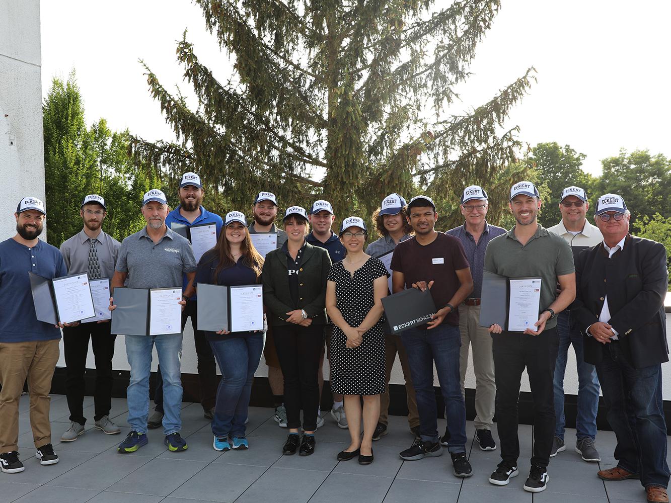Penn College manufacturing students share a moment with their German hosts after completing their Precision Machining in Germany course