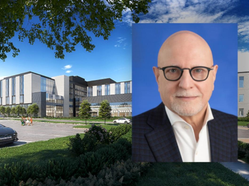 A headshot of a man overlaid on a photo of a rendering of a hospital