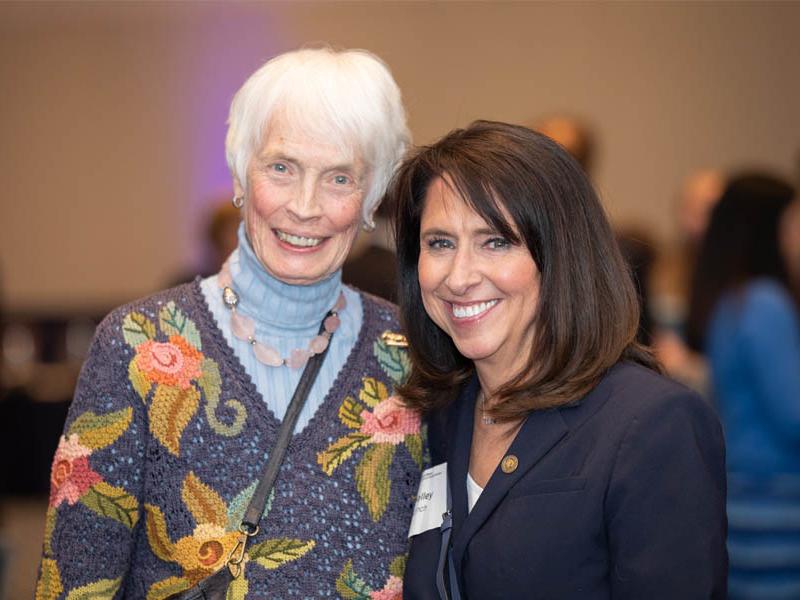 Alumni Association president Kelley Lynch poses with Anne Riley ’64. 
