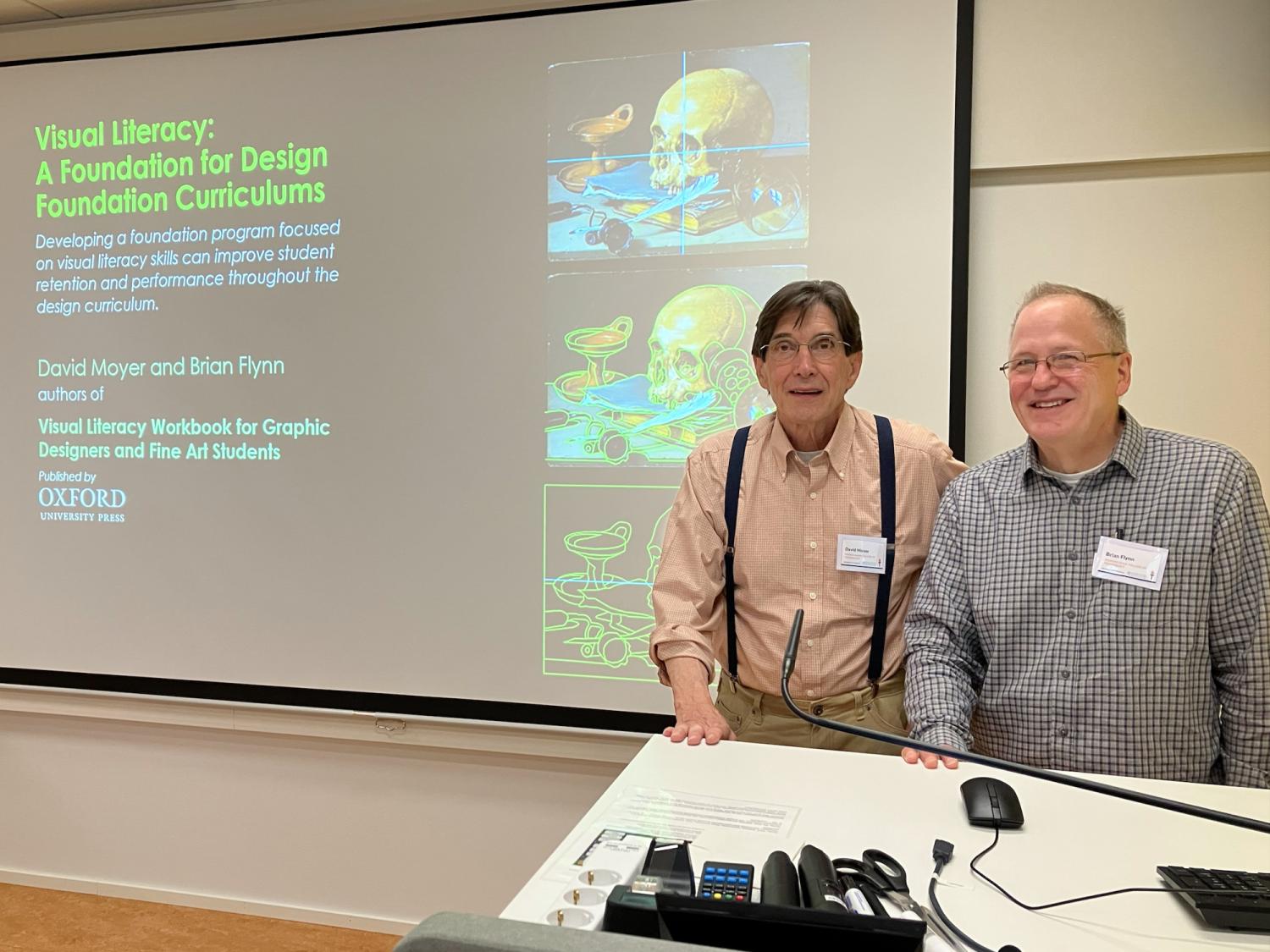 Two presenters at conference in Finland