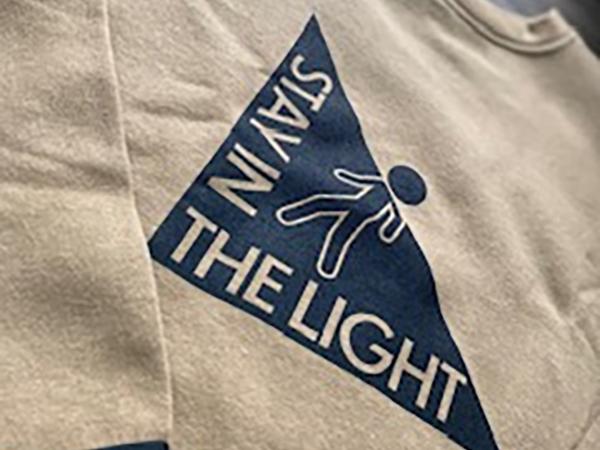 Photo of gray sweatshirt with blue design