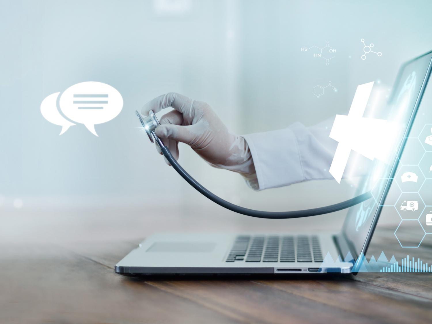 A doctor's hand with stethoscope protrudes from a laptop screen.