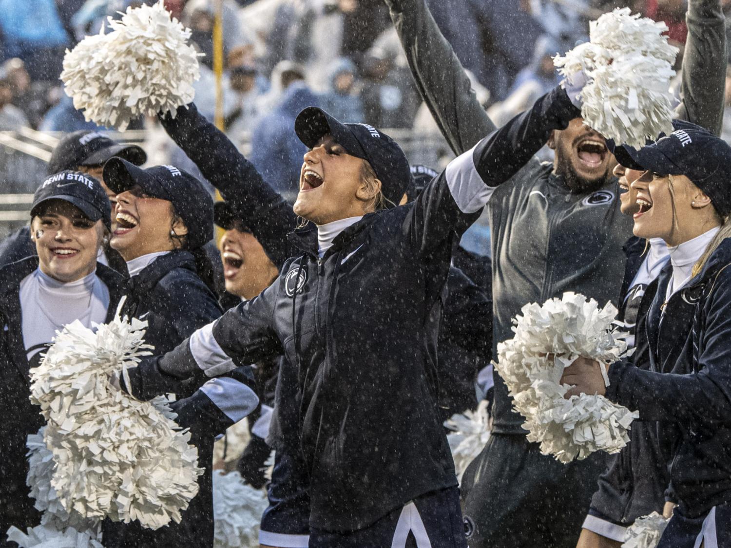 cheerleaders at rainy beaver stadium