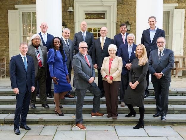 A group of award recipients posing for a photo
