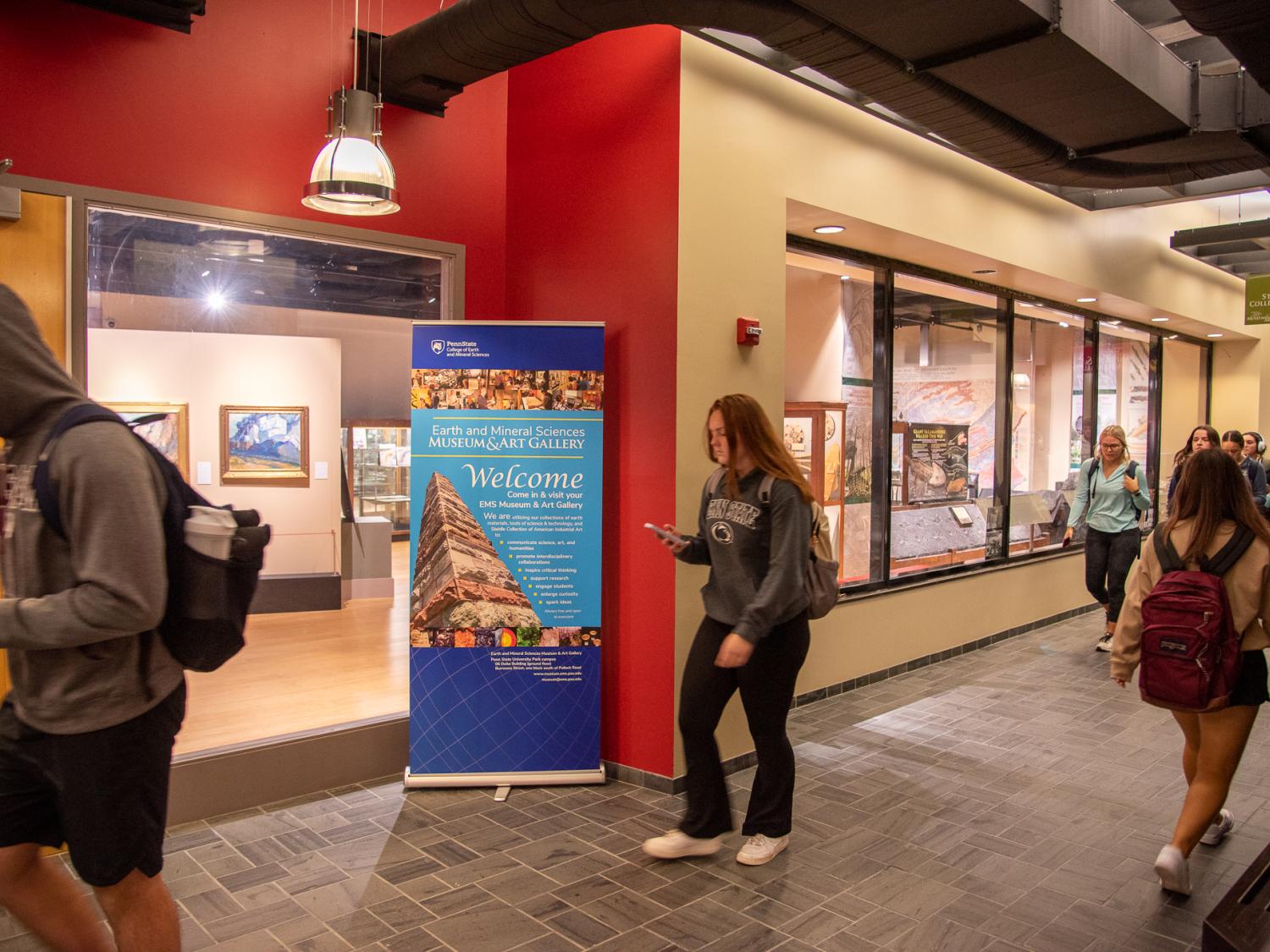 EMS Museum and Art Gallery entrance with people walking in