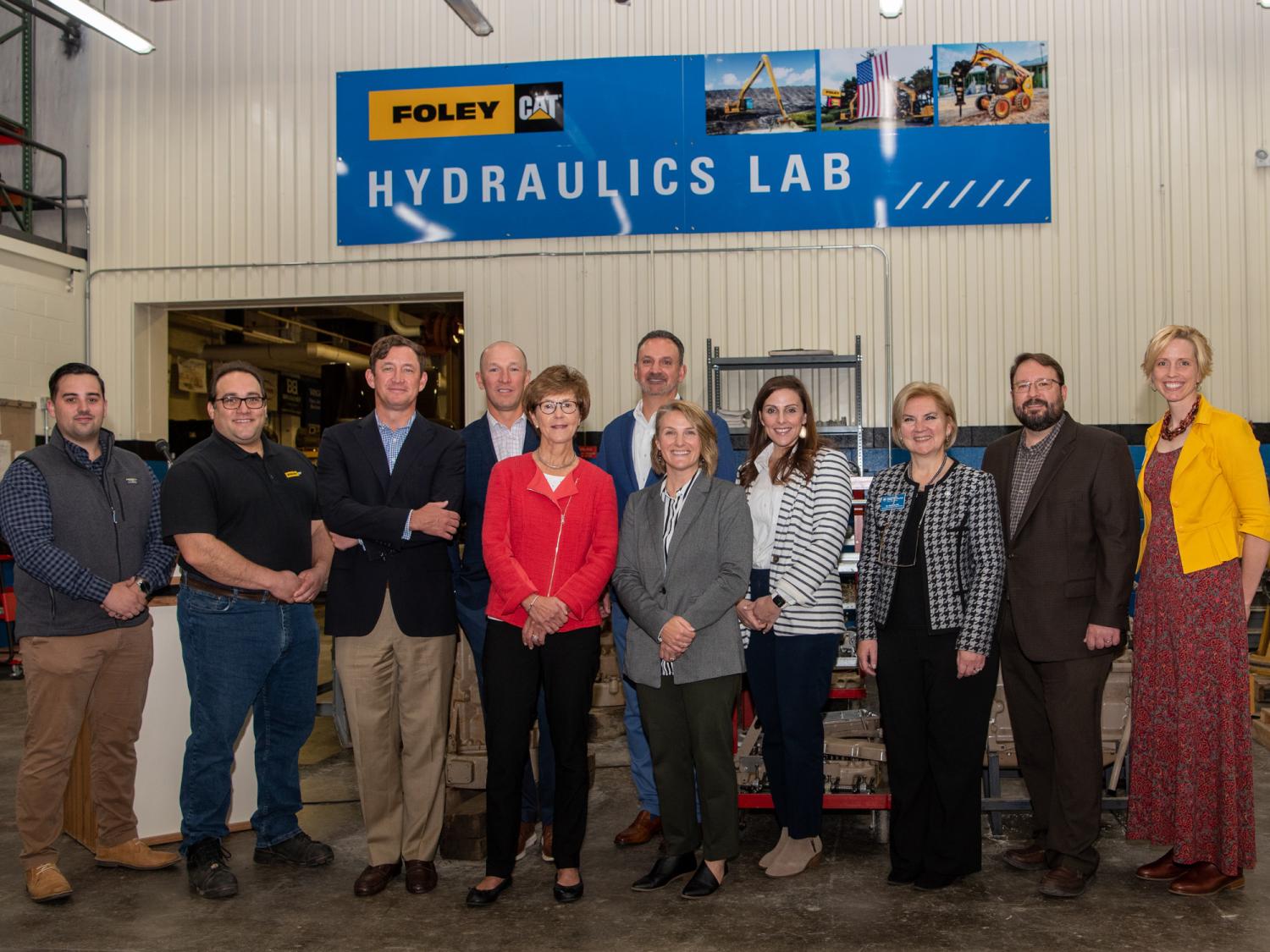 Representatives of Foley Inc. and Pennsylvania College of Technology gathered at the Schneebeli Earth Science Center on Oct. 10 to celebrate a 20-year partnership.