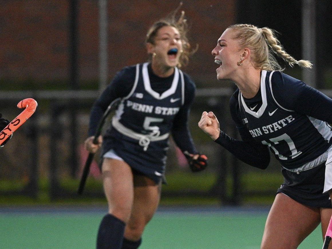 Field hockey players celebrate