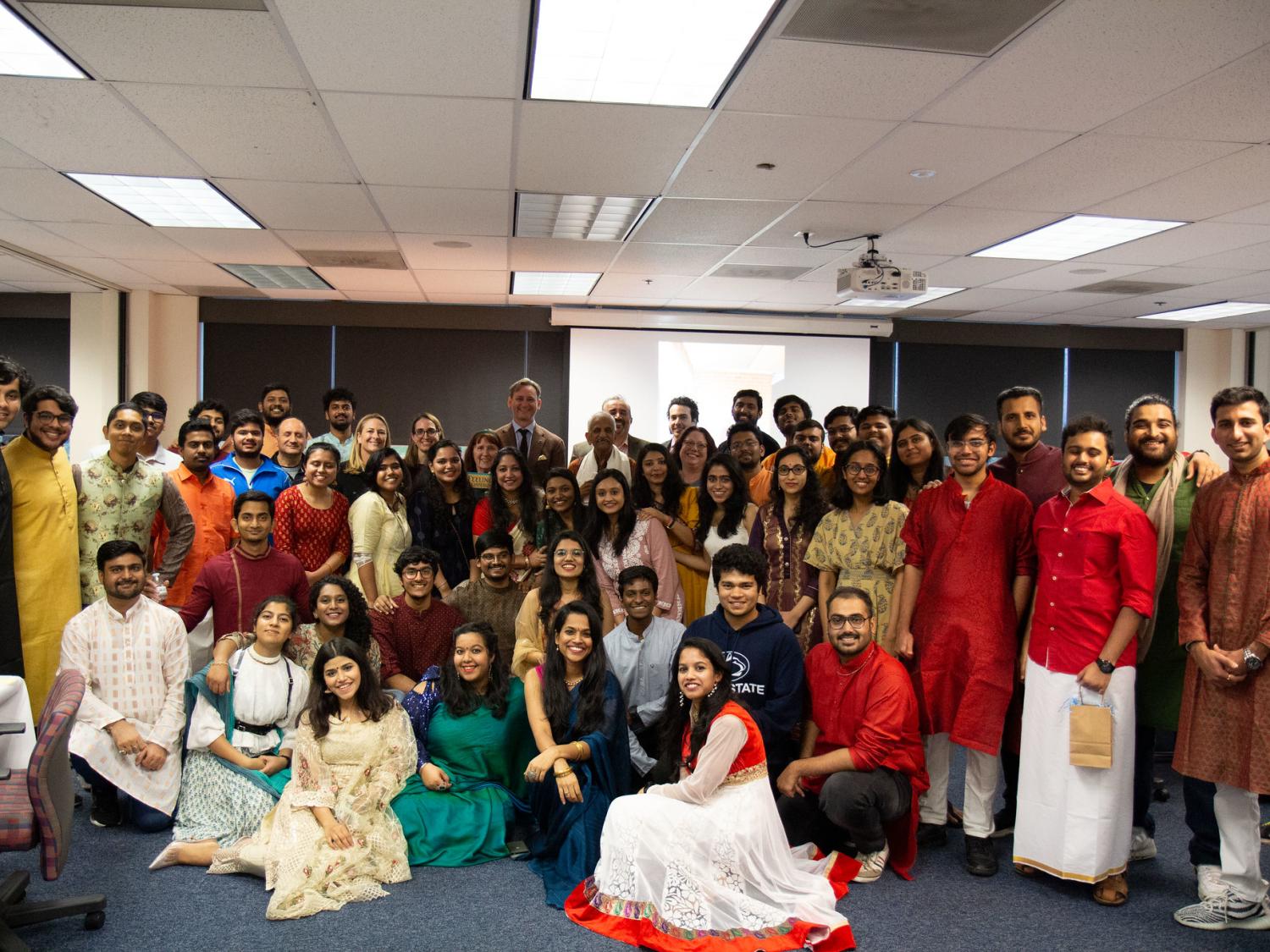 A group of students, staff, and faculty dressed up for Diwali