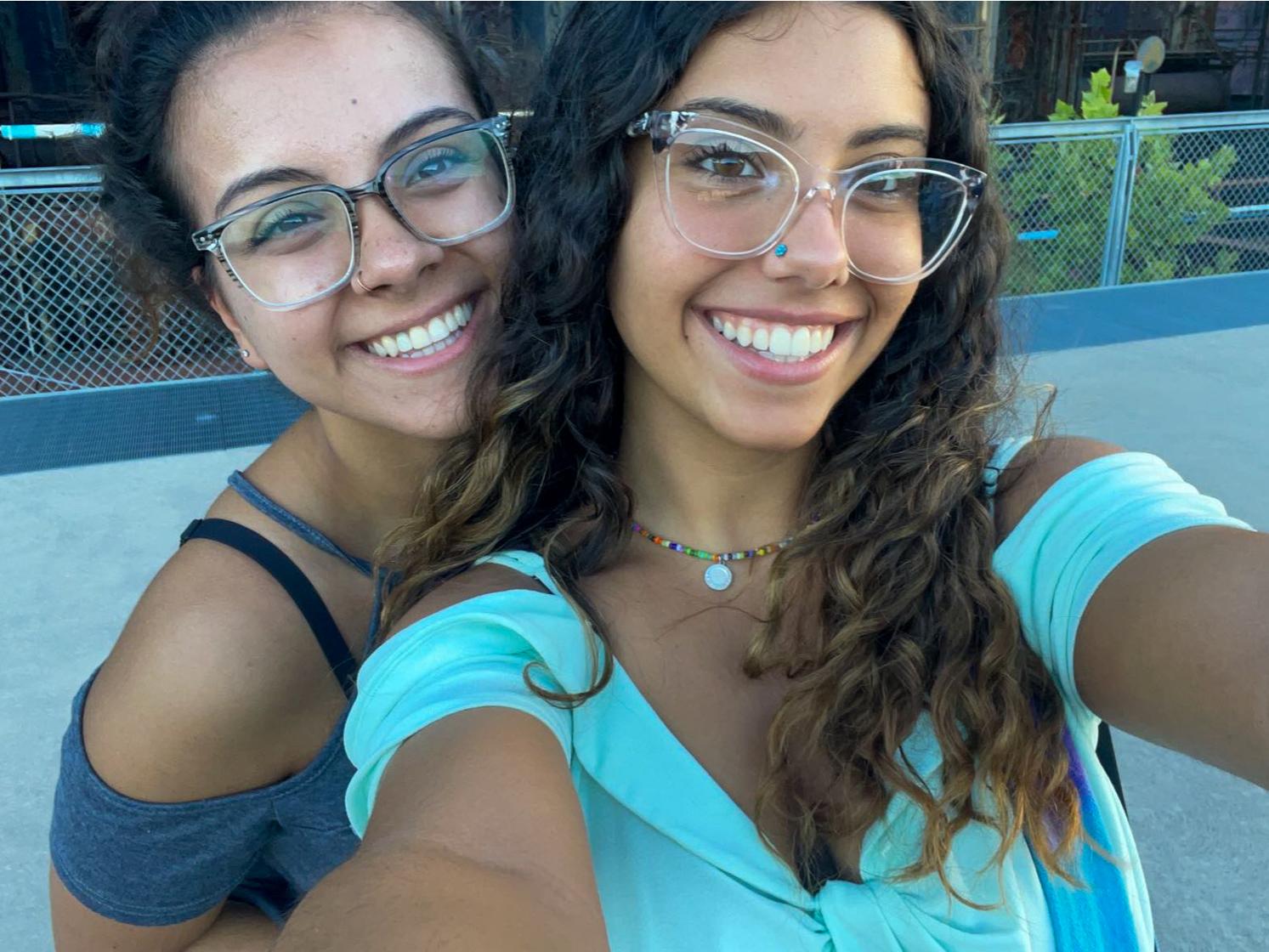 Aurora on left with sister