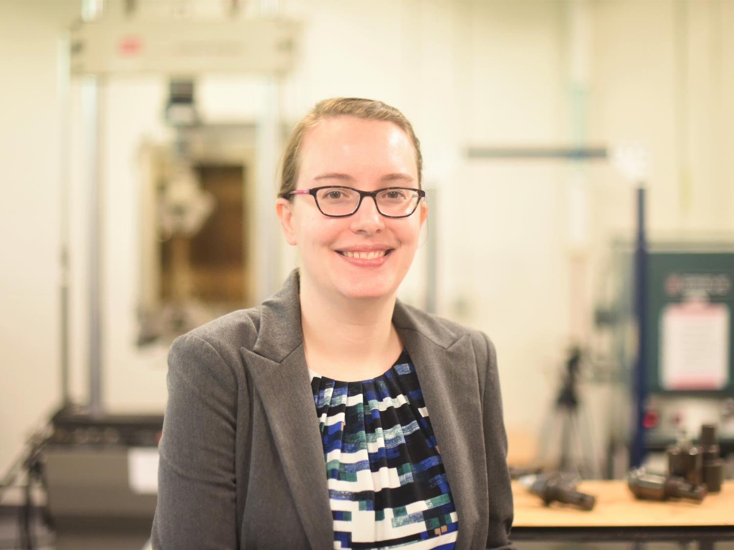 Beth Last, the research core facilities coordinator at Penn State Behrend, poses in the college's materials lab.