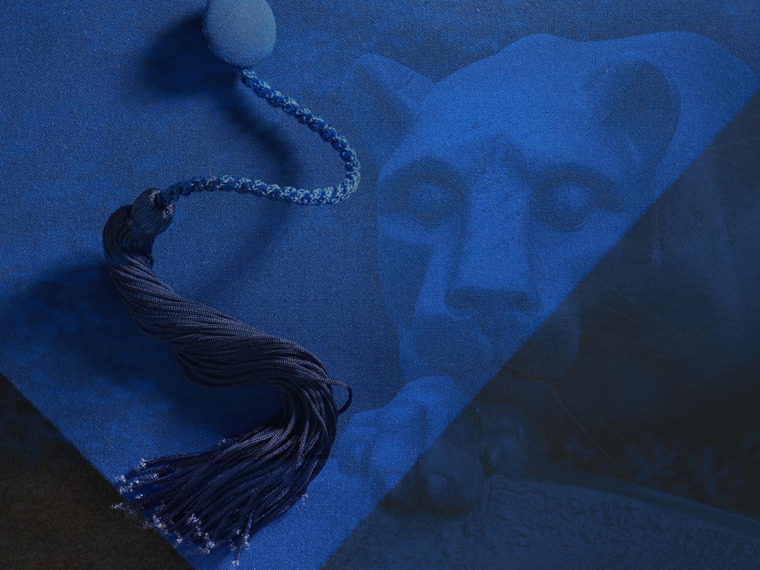 Graphic of Lion Shrine and Graduate Cap