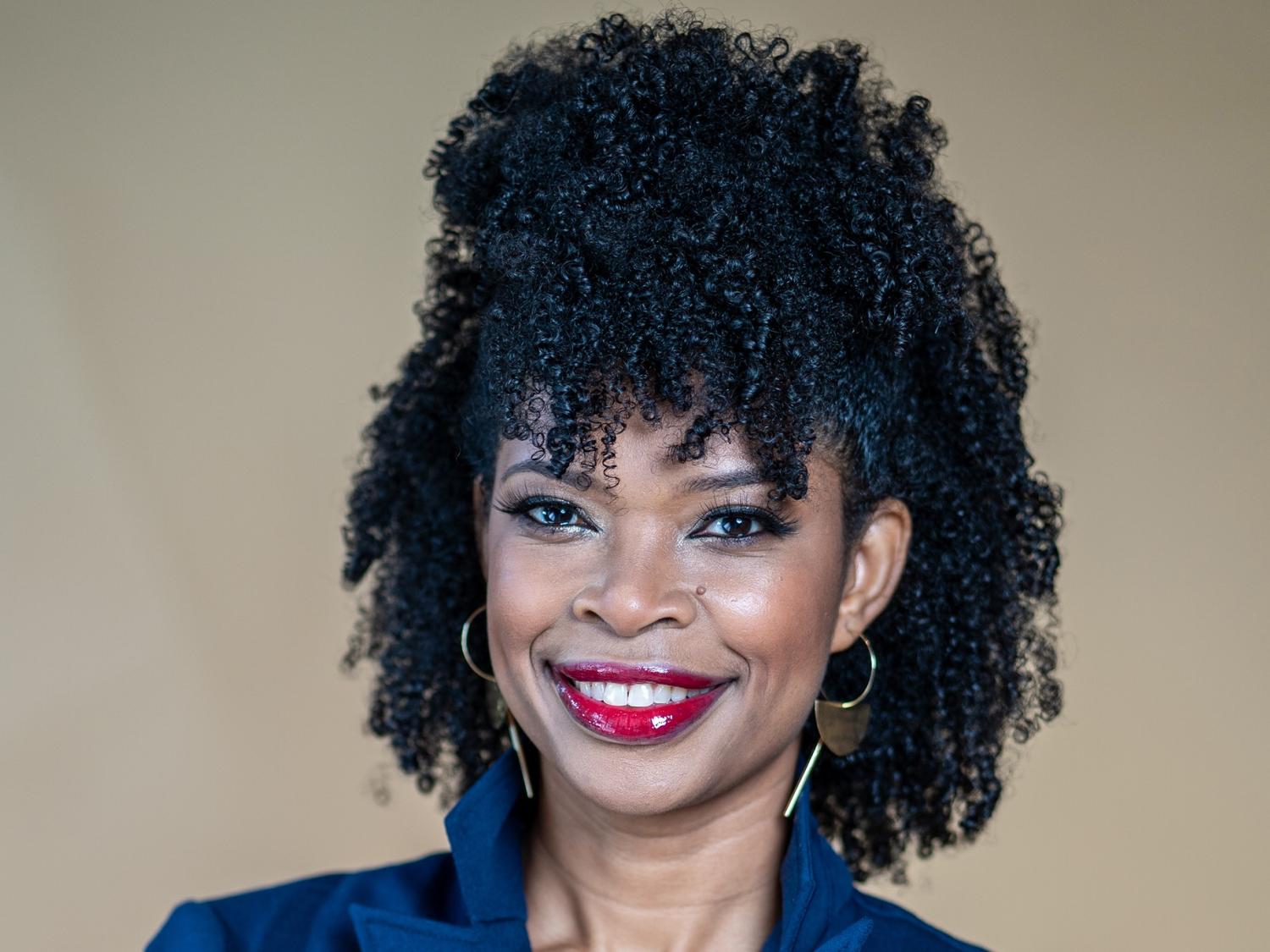 A portrait of Martina Edwards, the first Black woman to hold a seat at the New York Stock Exchange.