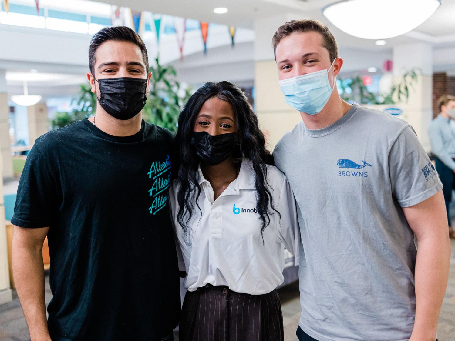 Three students attending an Innoblue event