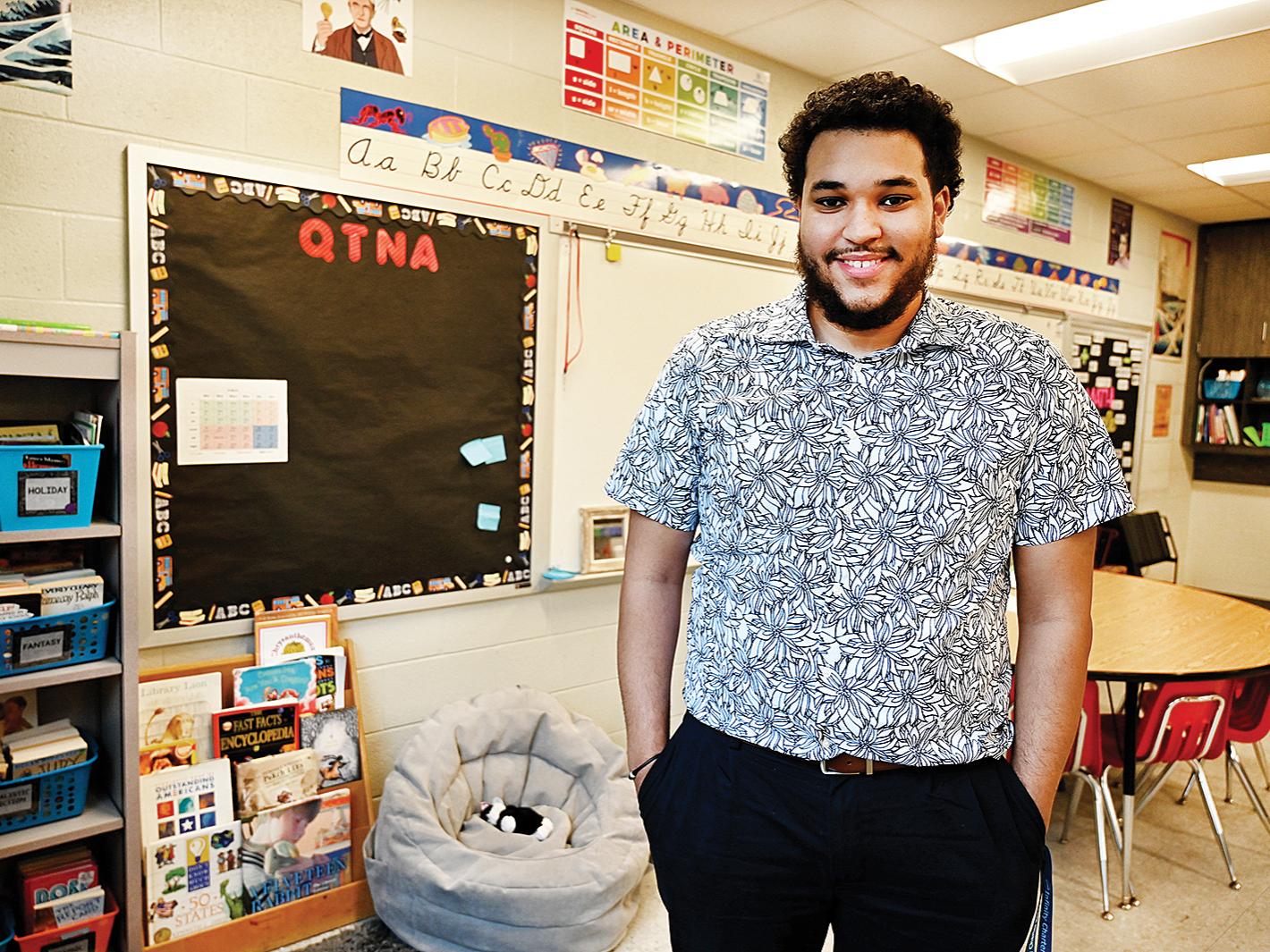 Photo of Brandon Reed-Porter in his classroom