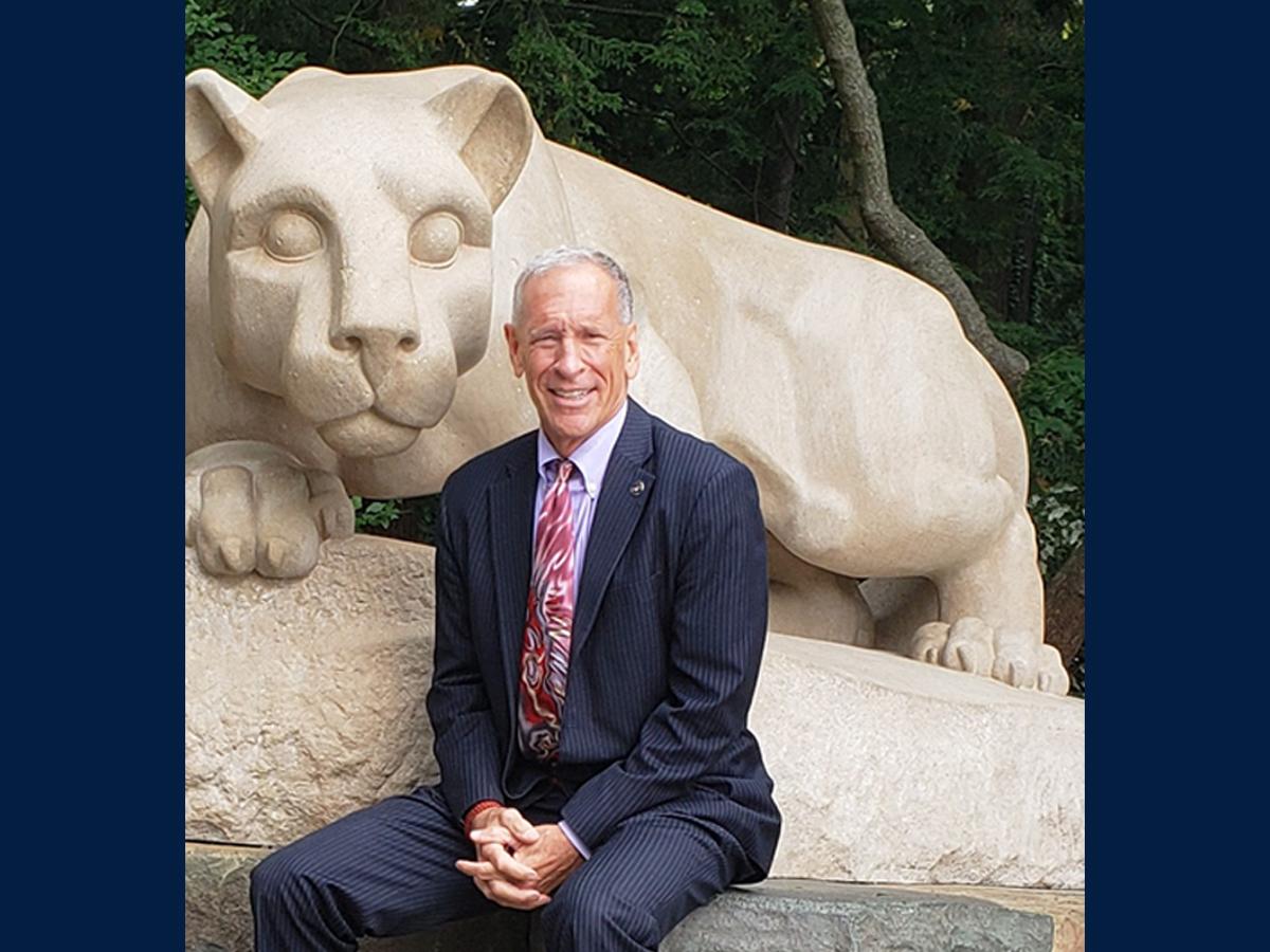 Eric Young in front of the Lion Shrine