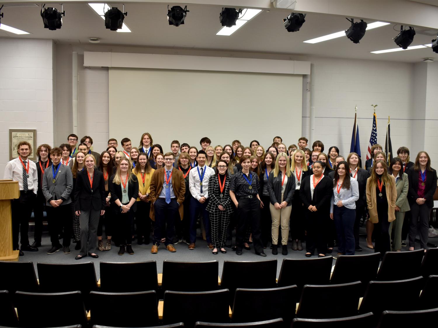 Medal winners from the 2022 Pennsylvania DECA District 1 conference gather in Hiller Auditorium during the awards ceremony.