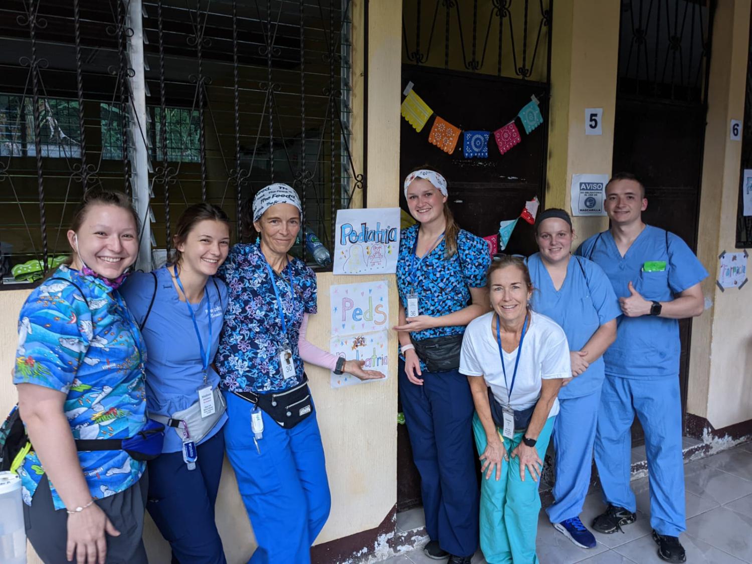Nursing students with instructor