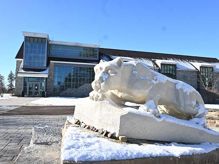 The Nittany Lion shrine at Penn State Wilkes-Barre surrounded by snow