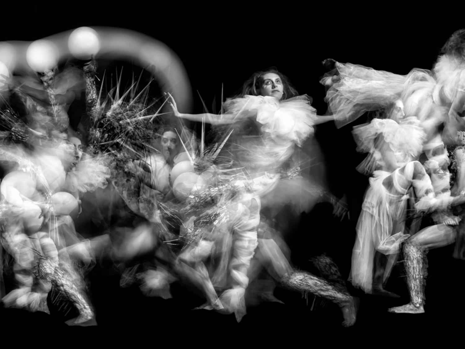 A detail of artwork depicting photographic imagery in black and white