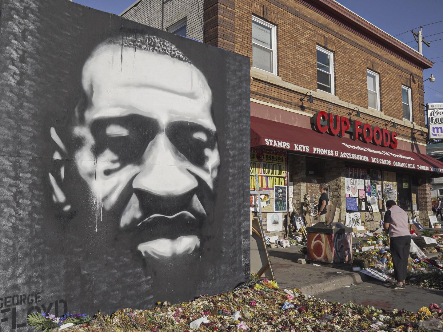 Street mural depicting face of George Floyd near site of his murder