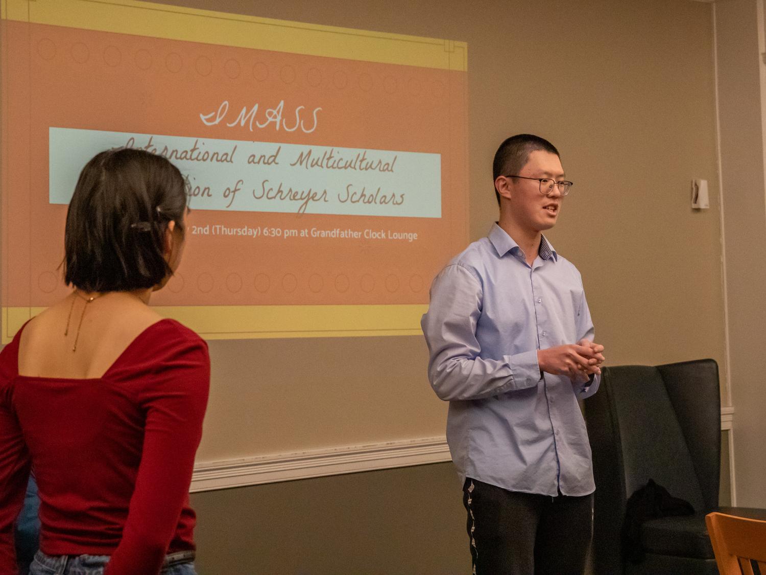 ziping ye making a presentation at his organization's lunar new year event