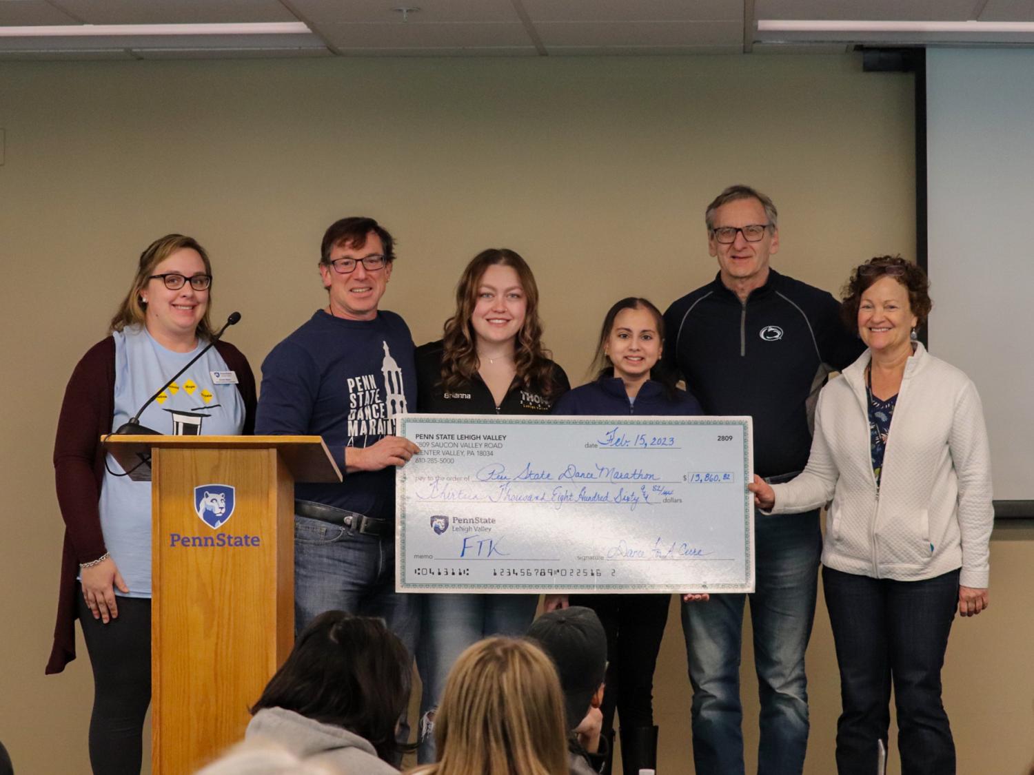Dance for a Cure presenting check to PSU-LV Benefitting THON's Executive board 
